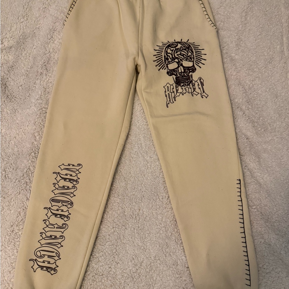 Cream Sweatpants with Skull Graphic